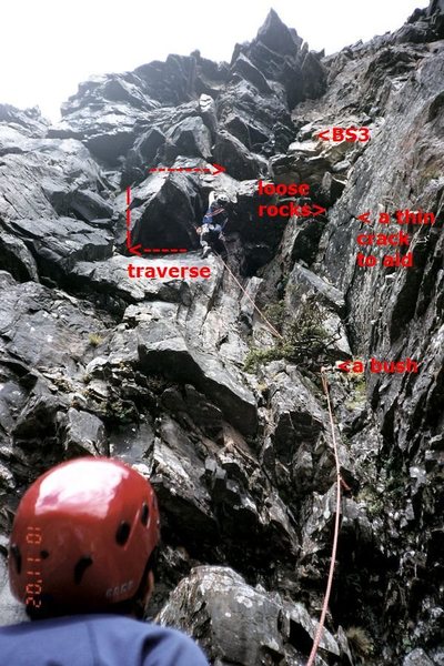 Our fearless leader, Raymond Chen, cranking up a big overhanging boulder up the pitch 2 (left alternative), where very loose rocks on his right, and he later decided to escape by traversing left, up, and right.