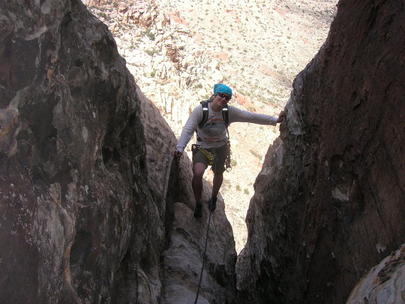 climbing into the alcove at the top of P5