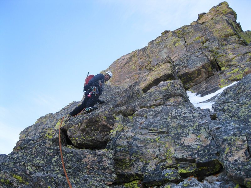Andy Grauch starting up the east ridge of The Saber on 1/29/11. Photo by Chris Sheridan.