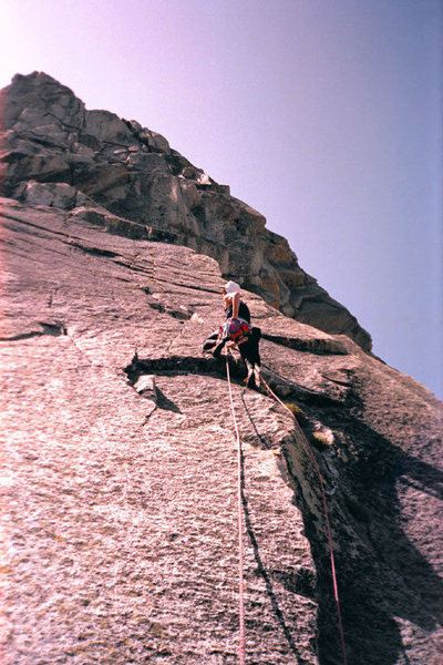 Kristian Solem leading on the North Buttress of The Silver Turret. We got stormed off later in the day.<br>
<br>
Photo by Guy Keesee, 1992.