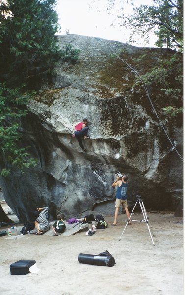 The "Mantle" move. Press down with left hand on slick, nearly vertical mantle. Right hand pulls on good undercling. Right foot up high on tiny clam shaped foothold praying to the rock gods (They don't exist) it doesn't pop off as you throw your hip up timing it so your knee doesn't get jammed into your armpit causing irreversible and catastrophic failure. <br>
.