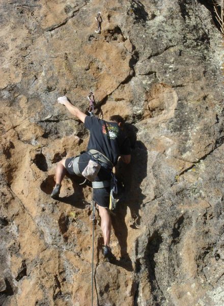 Vaino working way up past the crux.