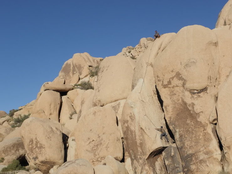 Cody following Tall Boy, Justin belaying from the top<br>
(photo by Todd Gordon)