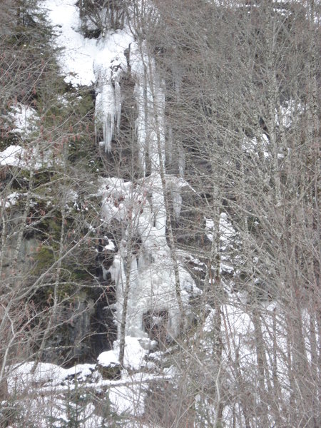 I had to snag this photo from the highway since the pullout was too deep with snow and I couldn't get to the base of it.