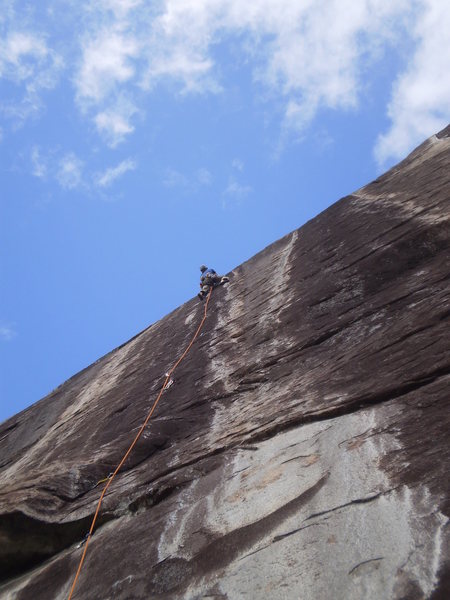 Finishing up P1 of Dinkus. The book makes the start of this section a little confusing. Stay to the left of the white streak, almost in the middle of the black streak. Belay with your feet in the first big horizontal.