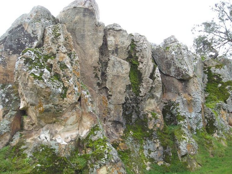 A head-on view of the overhang on the north face. Excellent climb up the trough to the left of the mossy streak.