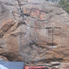 This is The Inferno to Paradise Boulder and the first ascent of it is a problem called "Stairway to Heaven". It is a V5.