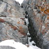 Base of 1st pitch, some ice at crux positions, loosely bonded, M5