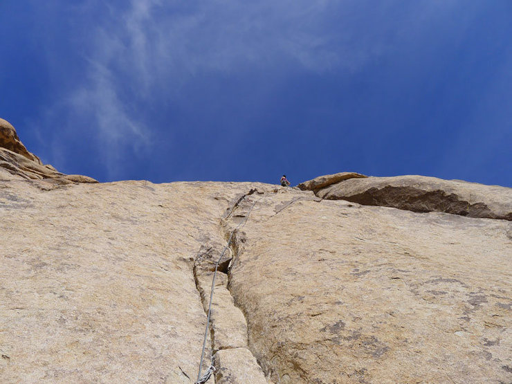 on the right curving crack past the 2 bolt belay