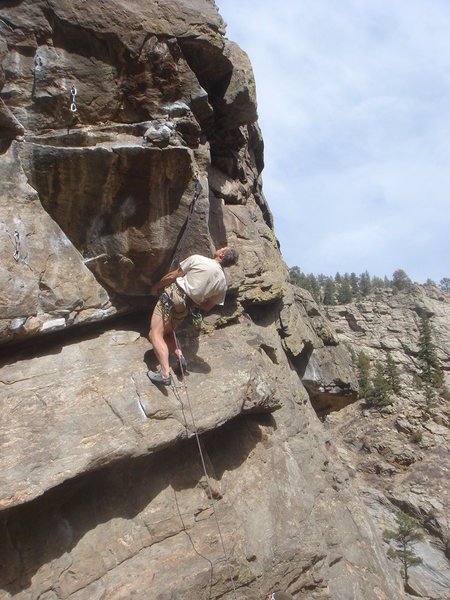 Bruce Vollmer eyeing the crux of Overpass.
