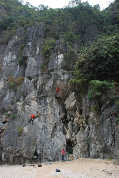 Left wall of Moody Beach. Climbers on Barefoot Vietnamese and Mao De.