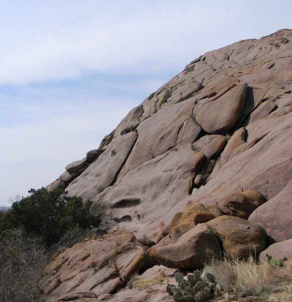 Jane belaying a climber on Cowboys and Cossacks