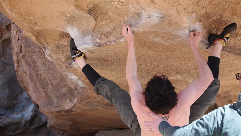 Hammering out the crux of Mexican Chicken in Hueco Tanks