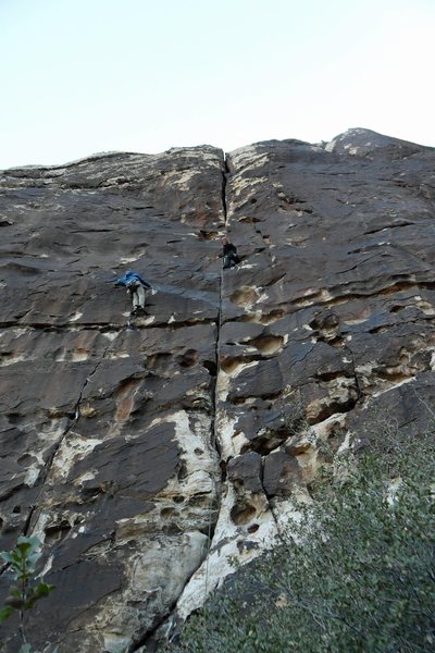 Brenda at 1st pitch anchors of Ragged Edges. Climber to the left is on Plan F.
