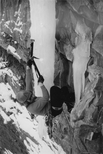  Eric Wright leading Gold Digger on the  first ascent. (Left of the Silver Pick) M7-M8?  1997  Near Telluride CO.<br>
In plastic Lowa boots and Black Diamond leashes. Had to do a figure four to reach this free hanging dagger.<br>
