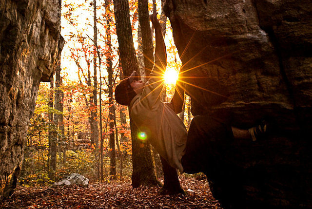 Aaron Parlier on a line on the Left Corridor Boulder. Photo by Sarene Cullen