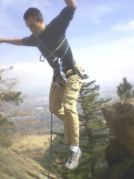 Another blurry pic of the jump move. Rob high over Boulder.