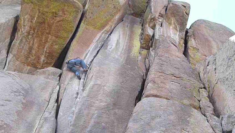 Thin crack before the first wide crux.