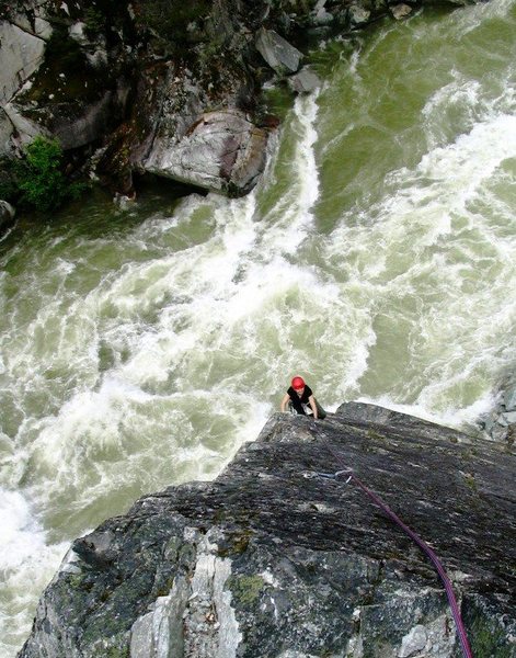 Annie Simard seconding the middle pitch of Star Chek above the raging Cheakamus River at high flow.