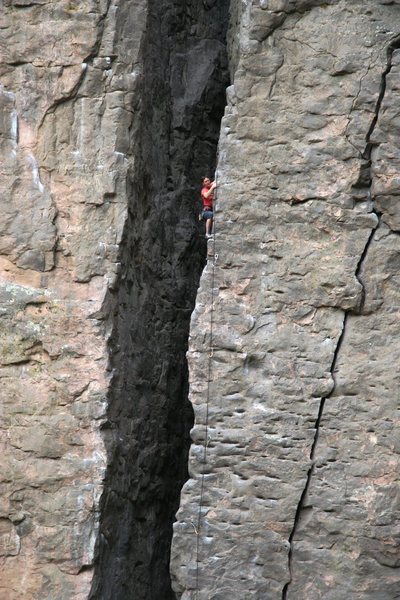 A climber high on Giveaway, 5.10a