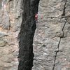 A climber high on Giveaway, 5.10a