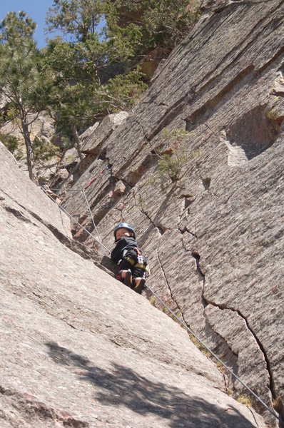 Garrett Gillest cleaning gear on "Let it Vee" at age 5.
