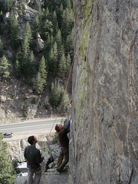 Luke Childers looking up at the route that would soon be called "Inner Gorilla." First day out on the route with friends, Kevin and Jay.