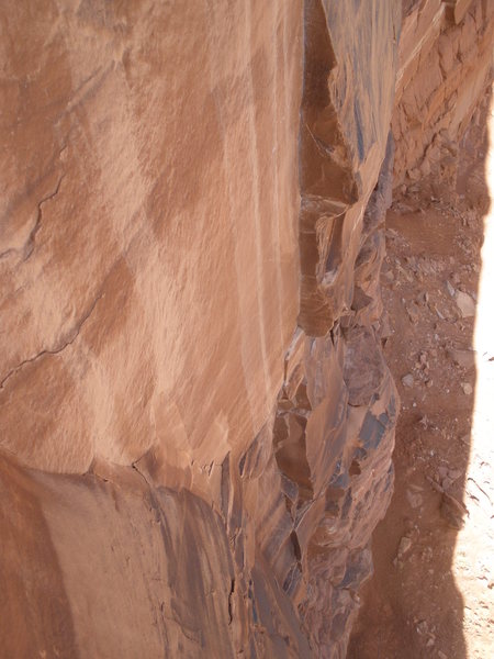 Looking down on the 2nd pitch finger section. The first pitch belay is the flat ledge in the lower center.