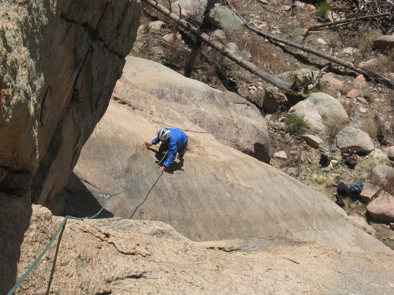 Garrett following the slab crux on P1. Not much to work with here other than friction. Spread your legs and trust the rubber!