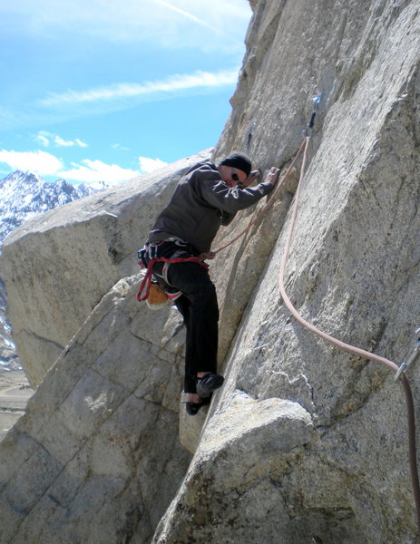 Traversing start to Hall Pass (5.10d).