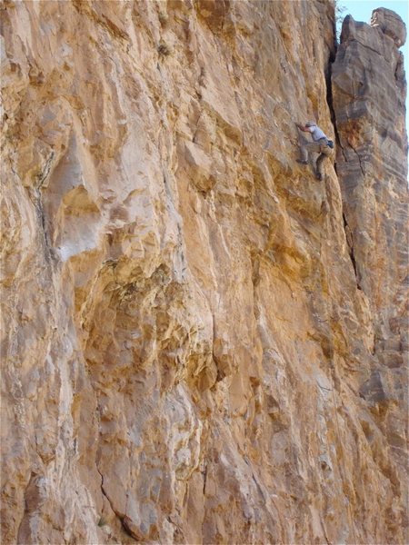 Jim Scott moving left to the anchors on his redpoint. Anchors are the same anchors used on Crescendo.