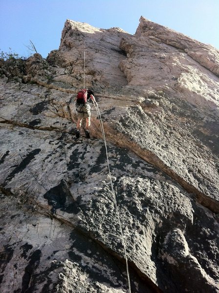 Rapping down from the anchor bolts. This is much easier than trying to hike down and hold on to the old ratty rope that's there as a handrail.