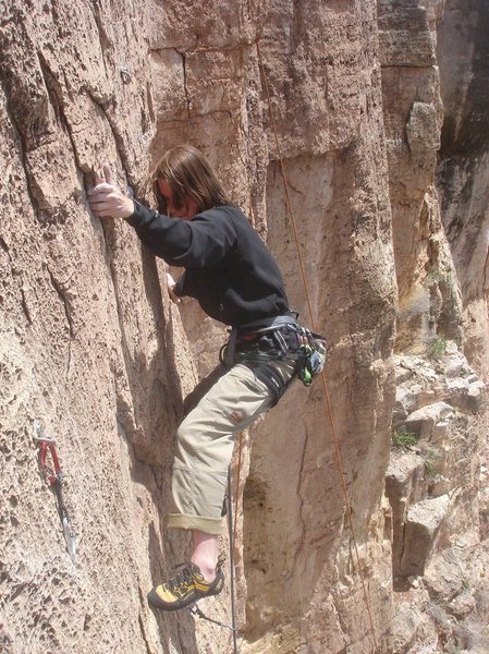Pushing through the crux to make that last clip.