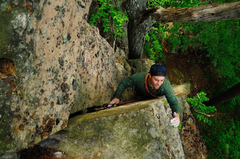 jim in the upper corner/arete making some of the last moves on "rigormortis"