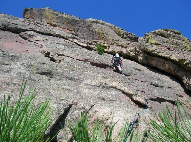 me leading from second anchor to third first flat iron boulder