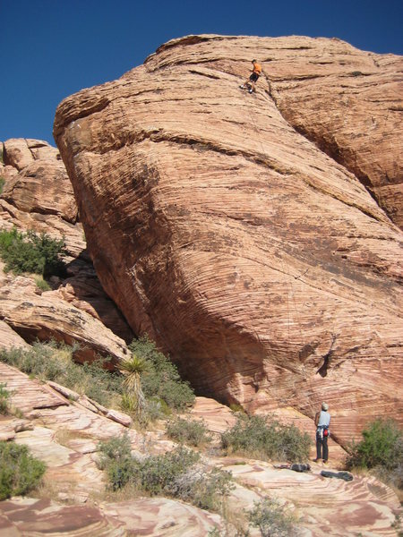 My son up top and me belaying him from the bottom. It was hot already and it was only 7:00am.