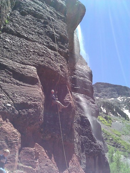 Rapping the 1st pitch w/ small waterfall to climber's right.