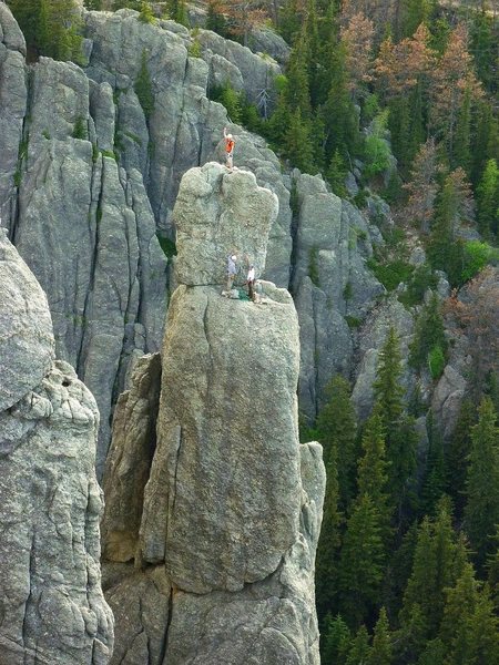 Travis on the summit of Spire 1, AJ and Brian at the belay station. Taken from Spire 4.