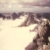 JB, summit ridge, Gannett Peak, Wind Rivers.  Mammoth Glacier in background. Aug 1984.