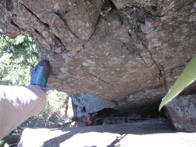 Looking down from the crux on the FA lead of 'Some Advice Is Hard To Follow. Photo by Tony B, 2011.  Micah belays.