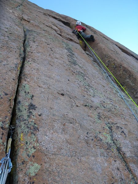 Bruce Miller leading the final offwidth to the top.