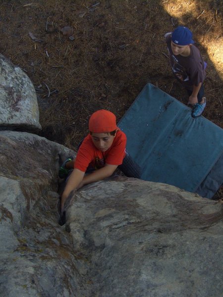Carlo Rivas climbing Free Thinker, Pine Mountain.
