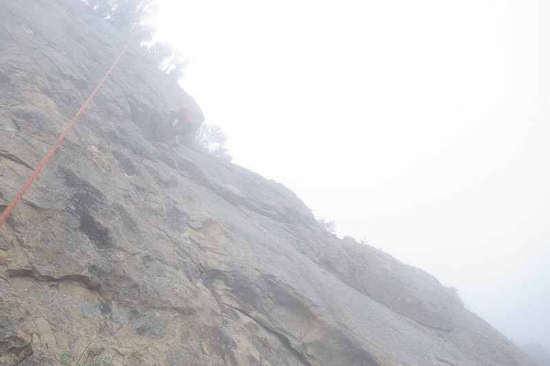 The heavy marine layer in Santa Barbara this summer has created some very unusual days of climbing.  Here Eugenia Davis climbs The Good the Bad & the Ugly, at crag Full of Dynamite, with visibility down to a couple hundred feet.