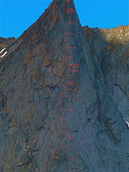 Detail topo of ITTIA pitches from the large ledge at the start to near the summit including pitches on Ambush Plaisir. Note that circles indicate belays while arrows are placed generally over or left of the line of ascent. Notes include pitch grades and brief descriptions. Larger arrows indicate rappel anchors.