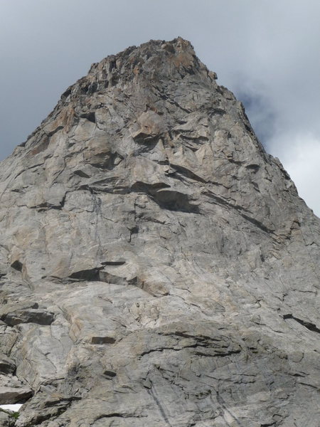 The formidable headwall of the east Face. ITTIA climbs slightly right (about 50-70 feet) of the very large roof at the base of the headwall