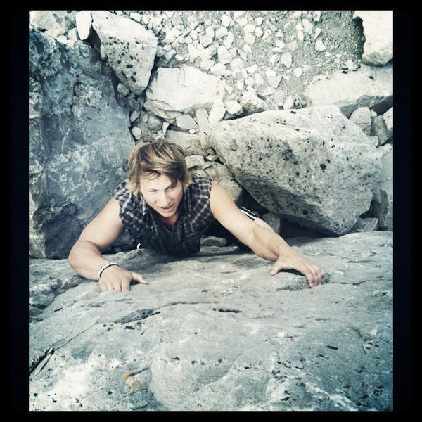 Levi Ziegler warming up on the Roadside Boulder