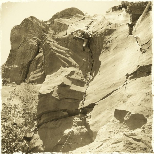 High-stepping out of the crux. 