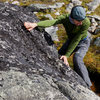 Gavriel J. bouldering in Tonquin Valley.<br>
Photographed by Chris Martin