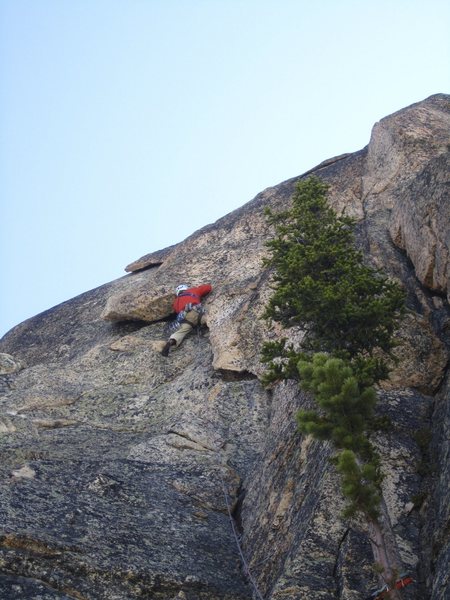 Climbing the 5.8 wide layback pitch. Photo by Brad J.