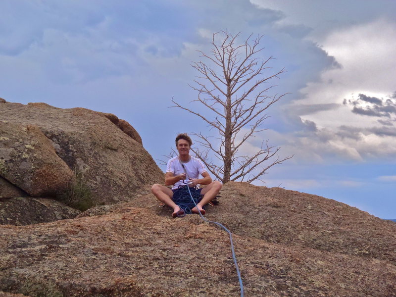 Drew sitting at the summit.